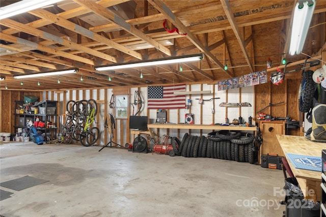 garage with a workshop area