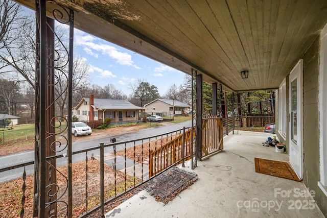 view of patio featuring a porch