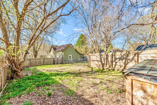 view of yard with a fenced backyard