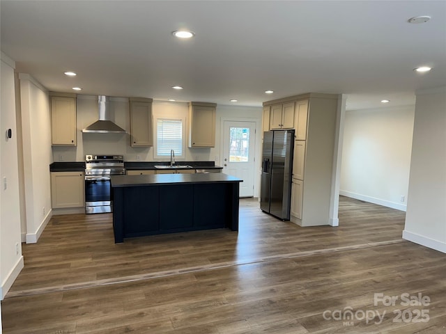 kitchen featuring wall chimney exhaust hood, sink, appliances with stainless steel finishes, dark hardwood / wood-style floors, and gray cabinets