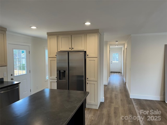 kitchen with stainless steel fridge with ice dispenser, wood-type flooring, dishwasher, and a healthy amount of sunlight