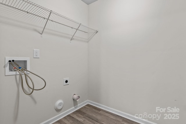 washroom with laundry area, hookup for a gas dryer, dark wood-style flooring, washer hookup, and electric dryer hookup