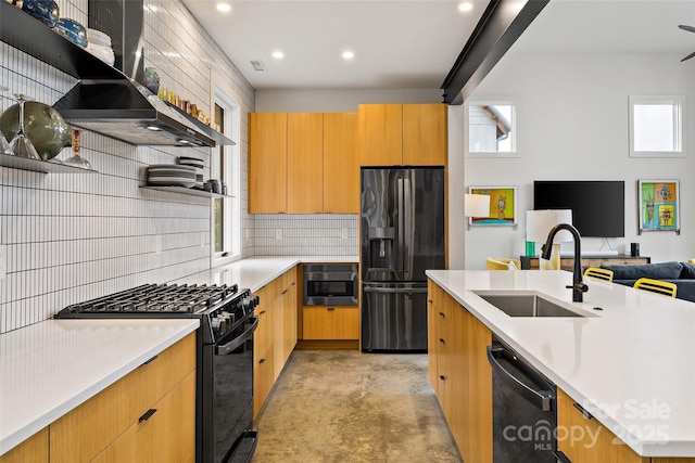 kitchen with a sink, black appliances, open shelves, and light countertops