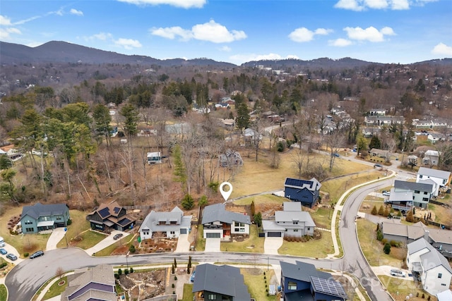 bird's eye view with a residential view and a mountain view