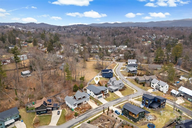 birds eye view of property with a residential view and a mountain view