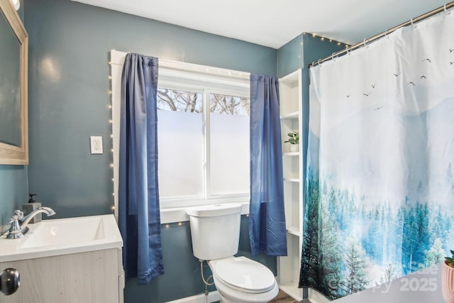 full bathroom featuring toilet and vanity