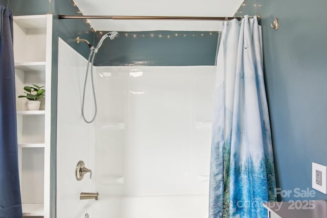 bathroom featuring shower / bath combination with curtain