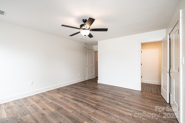 0 6th St NW, Hickory, NC 28601 - spare room featuring a ceiling fan, dark wood finished floors, and baseboards