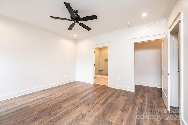 0 6th St NW, Hickory, NC 28601 - unfurnished bedroom featuring wood finished floors, ornamental molding, baseboards, recessed lighting, and ensuite bathroom