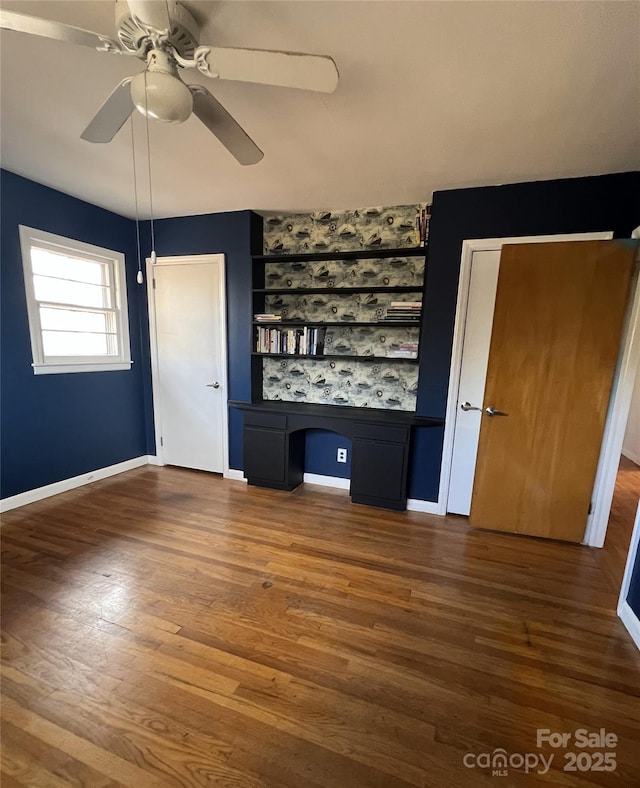 3367 Marshall Wolfe Rd, Kings Mountain, NC 28086 - interior space with built in shelves, ceiling fan, dark hardwood / wood-style flooring, and built in desk