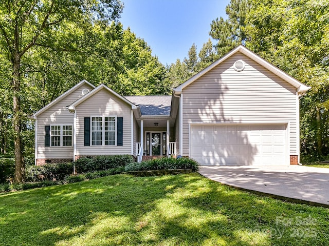 ranch-style house featuring a garage and a front yard