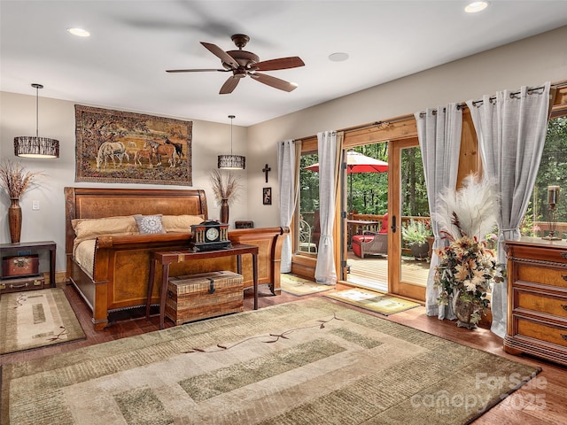 sitting room featuring ceiling fan and wood-type flooring