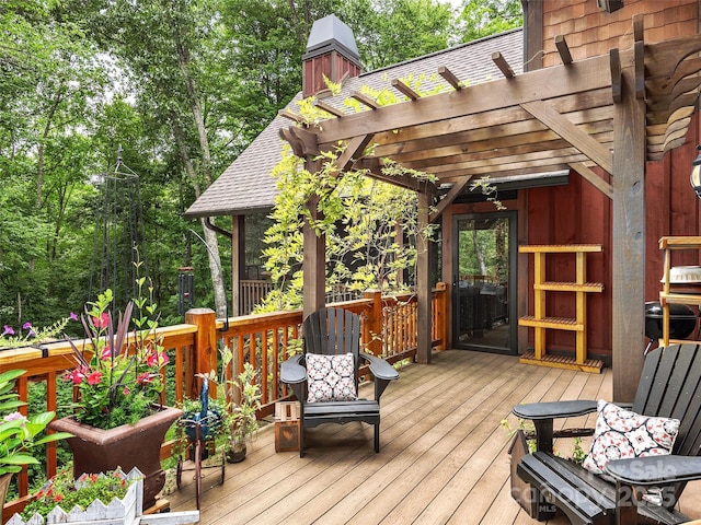 deck featuring a pergola