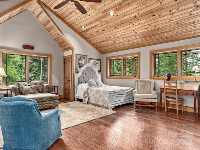 bedroom featuring multiple windows, wood ceiling, hardwood / wood-style flooring, and high vaulted ceiling