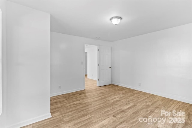 empty room with light wood-type flooring