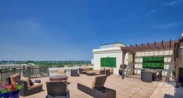 view of patio / terrace with a pergola