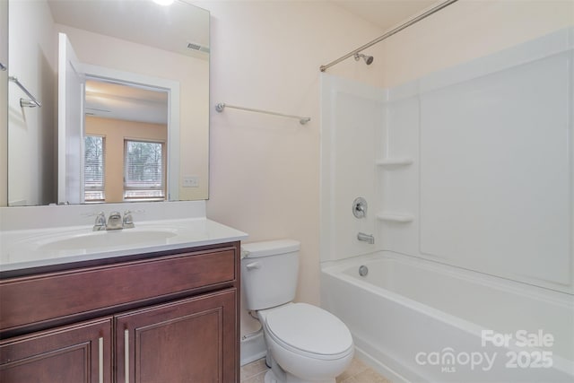 full bathroom featuring toilet, visible vents,  shower combination, and vanity