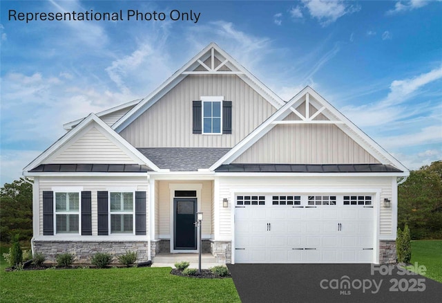1809 Ab Moore Jr Dr Unit 3238, Indian Trail, NC 28079 - craftsman house featuring stone siding, board and batten siding, driveway, and a standing seam roof