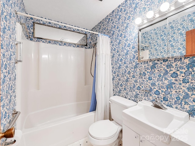 bathroom with shower / bath combo with shower curtain, vanity, toilet, and wallpapered walls