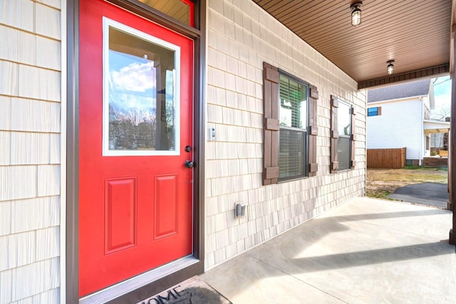 entrance to property with covered porch