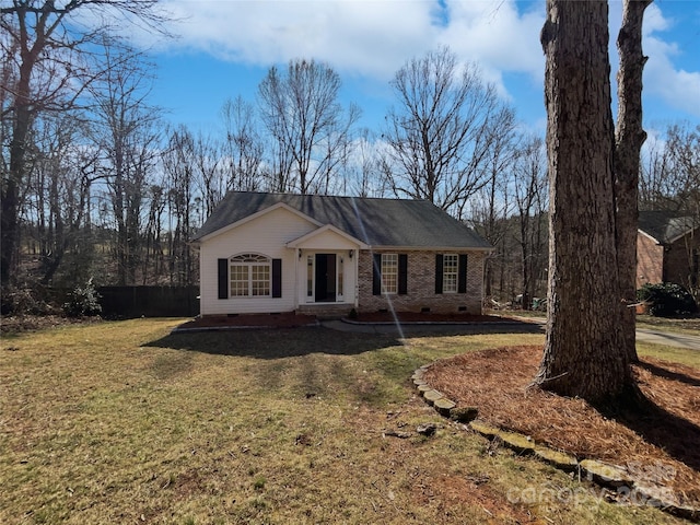 single story home with a front lawn