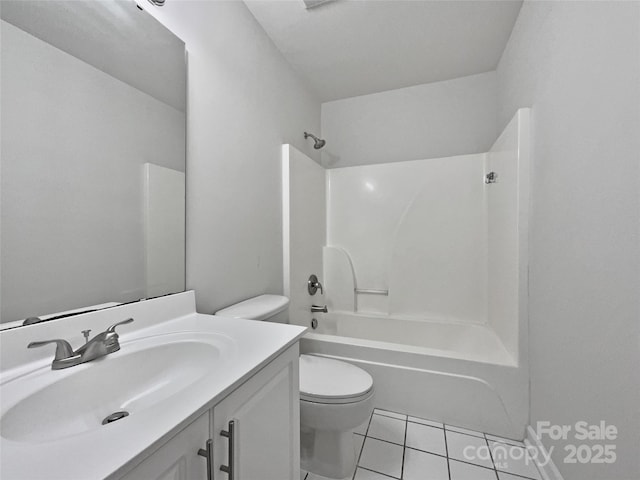 full bathroom featuring vanity, bathtub / shower combination, tile patterned floors, and toilet