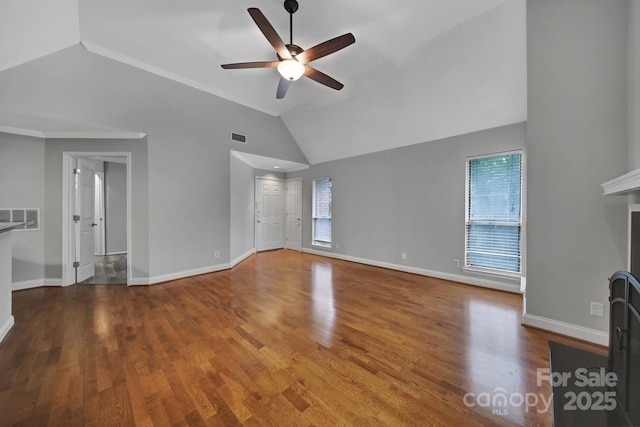 unfurnished living room featuring hardwood / wood-style flooring, ceiling fan, high vaulted ceiling, and a fireplace