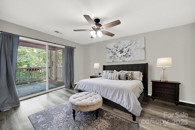 bedroom with hardwood / wood-style flooring, ceiling fan, and access to exterior