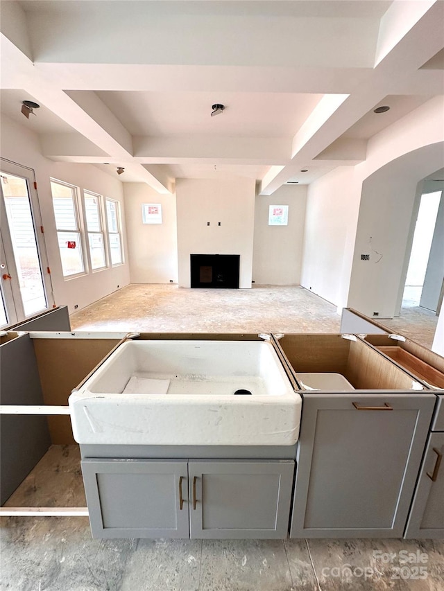 2530 Elkwood Cir, Charlotte, NC 28205 - living area with a large fireplace and beam ceiling