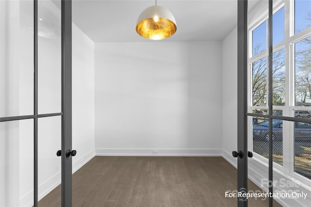 2530 Elkwood Cir, Charlotte, NC 28205 - unfurnished room with french doors, dark wood-style flooring, and baseboards