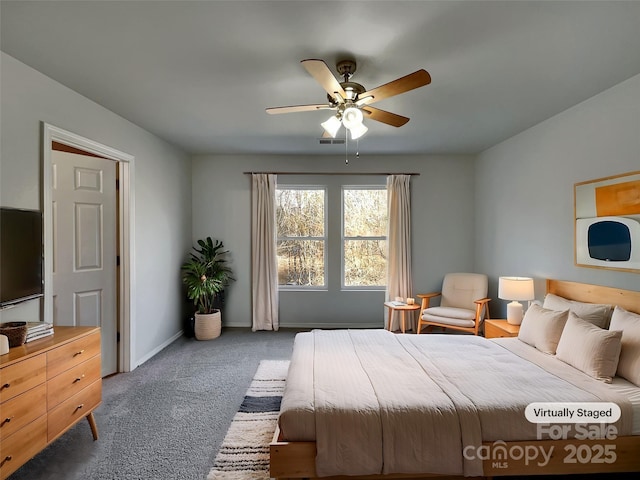 8353 Ainsworth St, Charlotte, NC 28216 - bedroom with a ceiling fan, visible vents, dark carpet, and baseboards