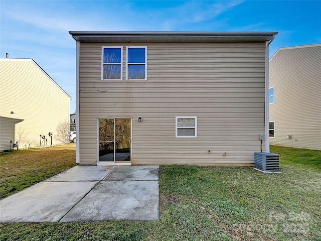 8353 Ainsworth St, Charlotte, NC 28216 - back of property featuring a patio, a yard, and central AC unit