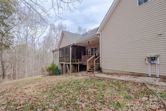 exterior space with a sunroom