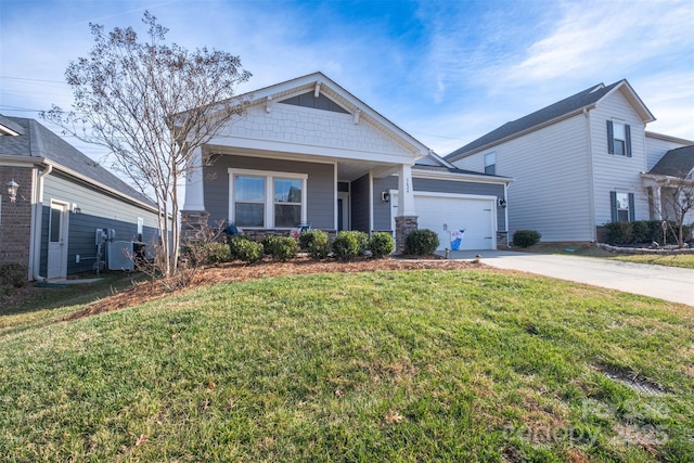 craftsman inspired home featuring stone siding, concrete driveway, a front lawn, and a garage