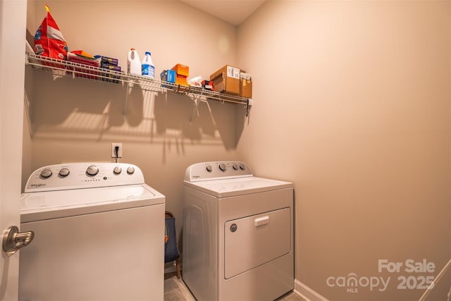 laundry area with laundry area and independent washer and dryer