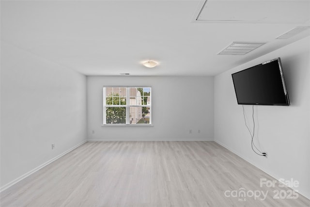 unfurnished living room with light hardwood / wood-style flooring