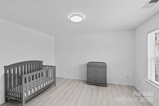 bedroom featuring light hardwood / wood-style flooring