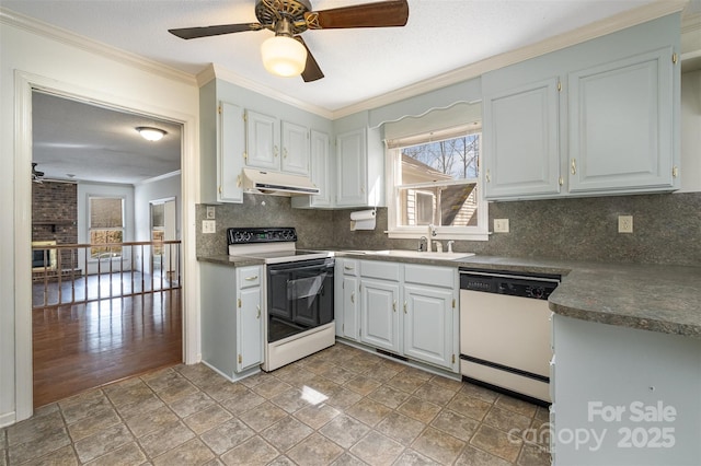 kitchen featuring sink, dishwasher, range with electric cooktop, white cabinets, and crown molding