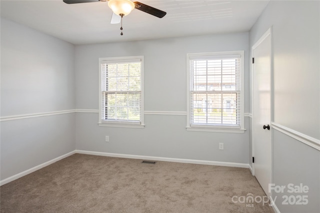 6322 Old Pineville Rd Unit E, Charlotte, NC 28217 - spare room featuring a wealth of natural light, carpet floors, ceiling fan, and visible vents