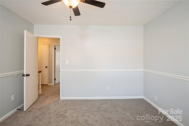 6322 Old Pineville Rd Unit E, Charlotte, NC 28217 - carpeted empty room featuring baseboards and ceiling fan