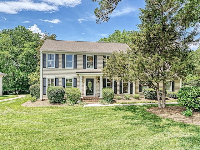 3600 Carmel Rd, Charlotte, NC 28226 - colonial-style house featuring a front lawn and a shingled roof