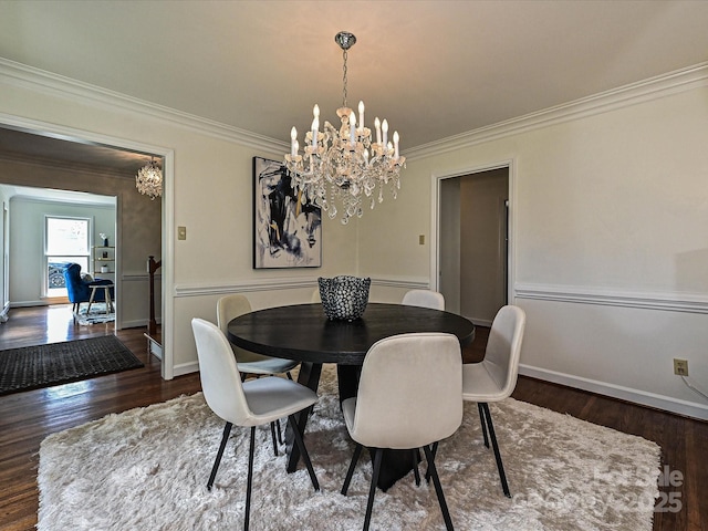 3600 Carmel Rd, Charlotte, NC 28226 - dining room with a chandelier, crown molding, wood finished floors, and baseboards