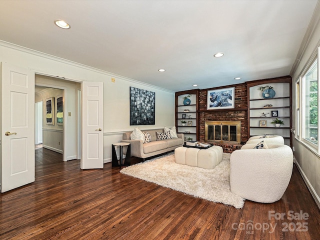 3600 Carmel Rd, Charlotte, NC 28226 - living room with ornamental molding, baseboards, dark wood finished floors, recessed lighting, and a brick fireplace