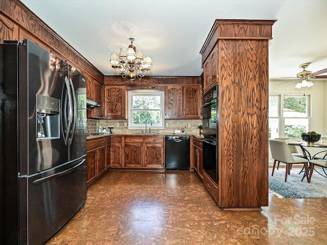 3600 Carmel Rd, Charlotte, NC 28226 - kitchen featuring black appliances, a chandelier, backsplash, a sink, and dark floors