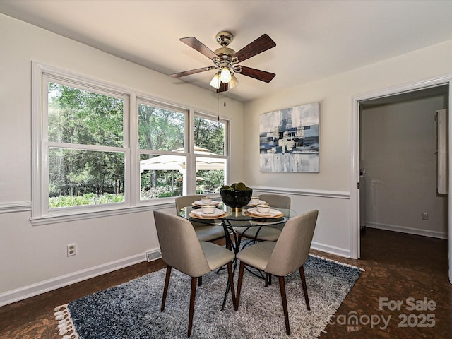 3600 Carmel Rd, Charlotte, NC 28226 - dining room featuring baseboards, healthy amount of natural light, and ceiling fan