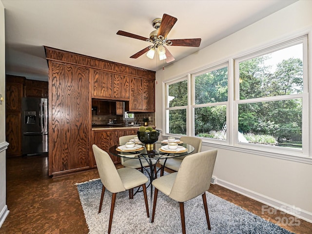 3600 Carmel Rd, Charlotte, NC 28226 - dining area with baseboards and ceiling fan