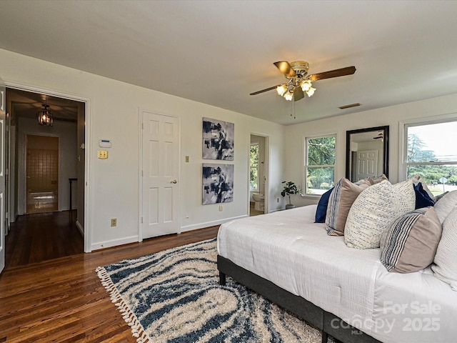 3600 Carmel Rd, Charlotte, NC 28226 - bedroom featuring wood finished floors, baseboards, connected bathroom, and ceiling fan