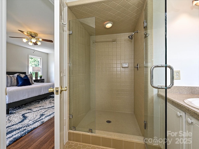 3600 Carmel Rd, Charlotte, NC 28226 - bathroom with ensuite bathroom, a ceiling fan, a stall shower, and vanity