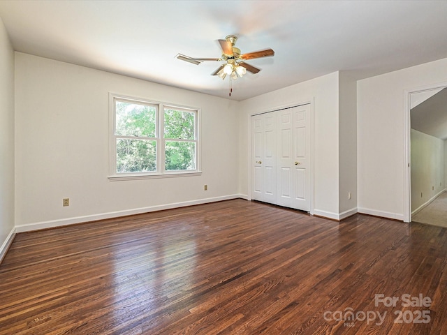 3600 Carmel Rd, Charlotte, NC 28226 - unfurnished bedroom with dark wood finished floors, baseboards, a closet, and ceiling fan