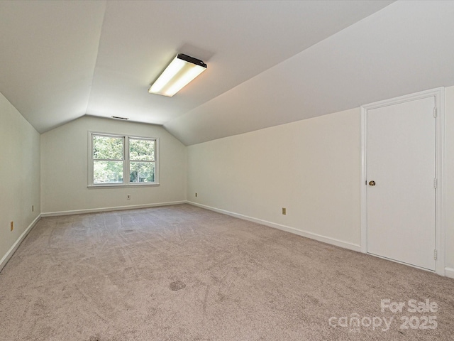 3600 Carmel Rd, Charlotte, NC 28226 - bonus room with light colored carpet, baseboards, and vaulted ceiling